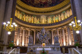 <center><center>Eglise de la Madeleine. </center></center>Derrière l'autel, entre les colonnes, peintures à fresque par Raverat (six saints et saintes, un archange) ; au-dessus des colonnes, le Christ au milieu des personnages de son temps, mosaïques par Gilbert-Martin, d'après les cartons de Ch. Lemaire. Au-dessus, la mosaïque a été composé par le peintre Charles-Joseph Lameire et réalisé à la manufacture de Sèvres pour les carreaux de verre coloré, sous la direction d'Auguste Guilbert-Martin. Au centre, le Christ de la Résurrection. Depuis le Christ, à sa droite, les saints Marie-Madeleine, Maximin (premier évêque d'Aix), Sidoine, son successeur, Martial, apôtre d'Aquitaine, Véronique tenant la Sainte Face (elle aurait suivi saint Martial en Gaule), Zachée, le converti qui aurait vécu à Rocamadour, Front, fondateur de l'église de Périgueux (sous les traits de Lameire), Georges, premier évêque du Puy, Flour, apôtre des Cévennes, Austremoine, fondateur de l'église de Clermont. De l'autre côté, à la gauche du Christ : Marthe, sœur de Marie-Madeleine, enterrée à Tarascon, Lazare, leur frère ressuscité, fondateur de l'église de Marseille, Marie Jacobé, mère de saint Jacques le mineur qui aurait accompagné Marie-Madeleine en Gaule, Marie Salomé, mère de Jacques le Majeur, qui assista aussi à la Passion et débarqua en Provence, Marcelle, servante de sainte Marthe, Trophyme, disciple de saint Paul et fondateur de l'église d'Arles, Eutrope, fondateur de l'église d'Orange, Ursin, premier évêque de Bourges, représenté sous les traits de l'architecte Charles Garnier, Julien, fondateur de l'église du Mans, Denis, fondateur de l'église de Paris.