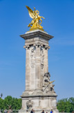 <center></center><center>Pont Alexandre III. </center> Rive gauche, amont  : La Renommée au combat, de Pierre Granet. A la base, La France à la Renaissance (Jules Coutan).