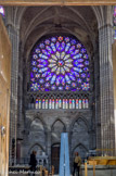 <center> Basilique Saint Denis. </center>Le portail Sud.  Pierre de Montreuil a donné la pleine mesure de son génie dans le transept… Le percement, au sommet des murs du fond de l’un et l’autre bras, d’immenses roses situées au-dessous d’une galerie vitrée permettait une large diffusion de la clarté, autrefois tamisée par des vitraux appropriés.