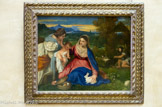 <center>La Vierge à l'Enfant avec sainte Catherine et un berger, dite La Vierge au lapin. Vers 1525 1530.</center> Tiziano Vecellio, dit TITIEN. La Vierge, assise dans un pré pour y manger des fruits, immobilise un lapin et le montre à l'Enfant remuant que tient sainte Catherine, agenouillée sur l'instrument de son martyre, la roue à crocs. Le paysage, surmonté d'un ciel crépusculaire strié de bandes orange et azurées, illustre le se d'une nature accueillante propre à Titien à cette époque de retour au giorgionisme. Le lapin blanc symbolise la pureté de la Vierge et le mystère de l'Incarnation, tandis que le raisin et la pomme dans le panier annoncent la passion soufferte par le Christ pour le rachat des péchés.