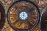 <center></center><center>Église Notre-Dame-de-Lorette. </center>  Chapelle de l'Eucharistie et du Sacré-Cœur. Pour la coupole. M. Périn a choisi pour thème cinq lignes d’une prose chantée par l’église le jour de la fête du Saint-Sacrement, écrite par saint Thomas d’Aquin. Dans l’arc placé au-dessus de l’autel (en haut), le Christ sort du tombeau. Les anges descendent, avec la trompette et le feu de l’encensoir. Dans l’arc opposé au précédent, nous voyons le Christ sur son trône déchirant les sceaux du livre de vie. Messagers de sa colère contre les pécheurs, deux anges descendent  présentant l’eucharistie sous les deux espèces. A gauche, saint Pierre debout tient et montre les clés. Saint Jean et saint Matthieu, tenant chacun son Evangile, sont assis à ses côtés. En face, saint Paul debout montre la première épître aux Corinthiens. Près de lui, saint Marc et saint Luc tiennent leur Evangile. Dans ces deux compositions, l’auteur a voulu exprimer les bons récompensés. Au-dessus des quatre évangélislcs planent l'ange, l'aigle, le lion et le boeuf, alttributs de chacun des écrivains sacrés.