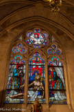 <center></center><center>Église Saint-Germain-l'Auxerrois.</center> Vierge de Pitié. Dans les deux trèfles de chaque côté sont représentés les instruments de la Passion : la lance, l’éponge, le roseau et les verges de la flagellation. Vitrail de Maréchal de Metz et de Gugnon, datant de 1847.